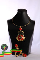 Bronze cross Necklace Bracelet Set on red Amber stone Parseghian Silver Smith & Gift articles store, Addis Ababa 